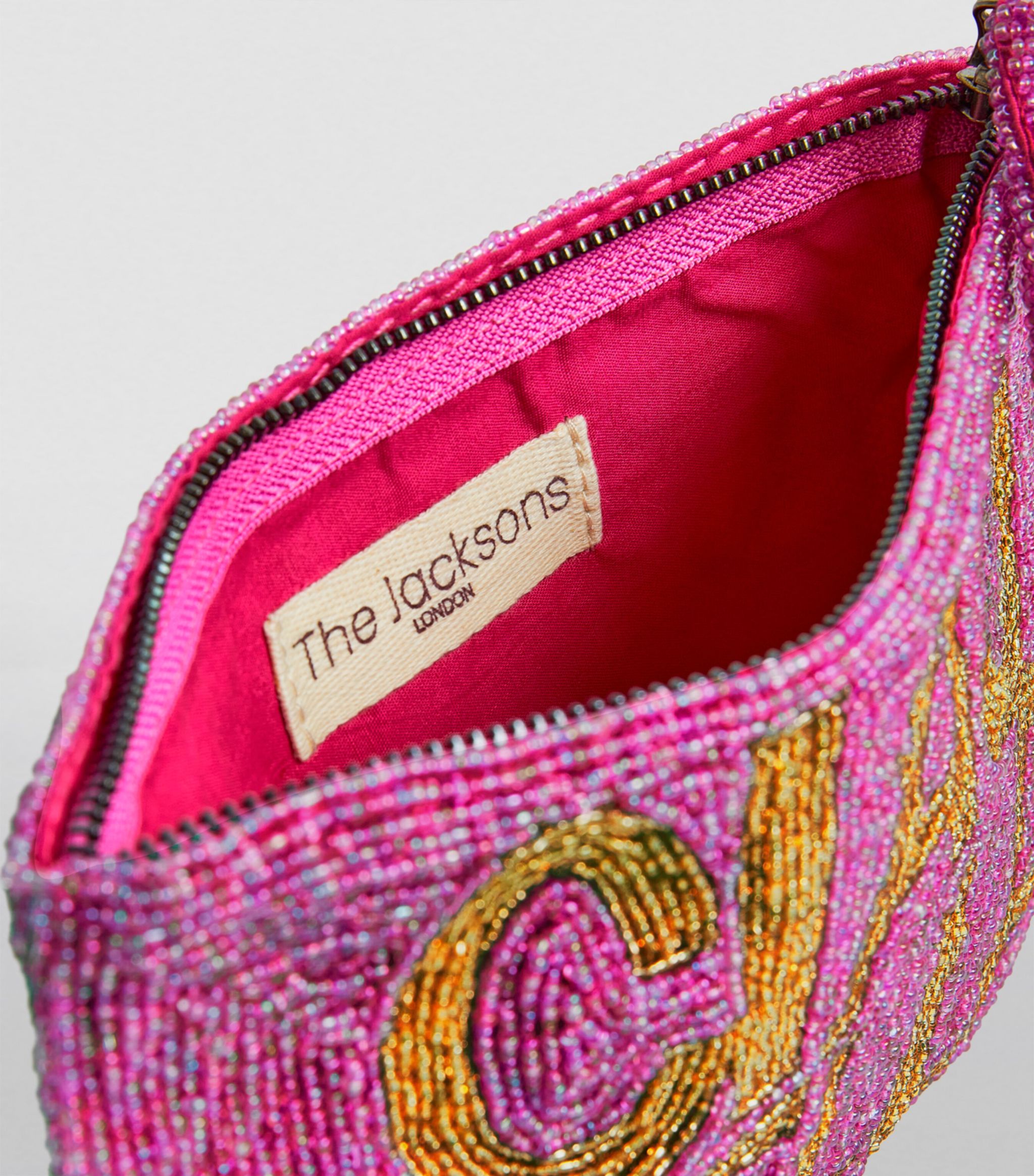 THE JACKSONS LONDON . CIAO BELLA BEADED CLUTCH PINK / GOLD