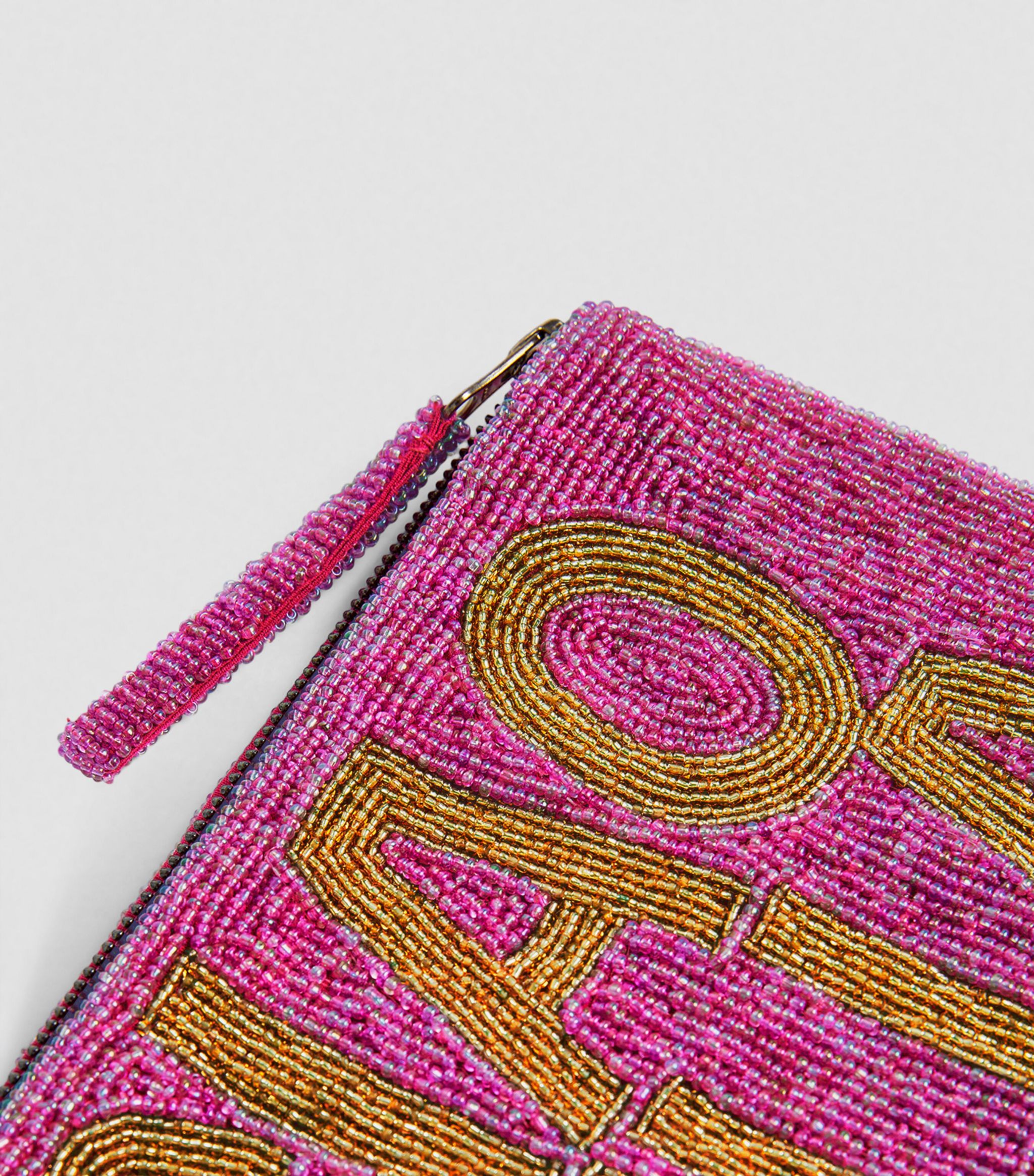 THE JACKSONS LONDON . CIAO BELLA BEADED CLUTCH PINK / GOLD